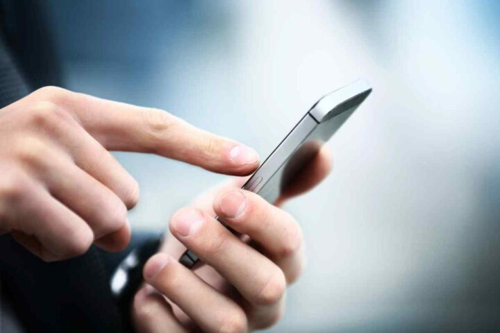 man making phone call from mobile phone